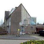 Stormschades in Barendrecht, gevelplaten waaien van woning aan de Torenmolen