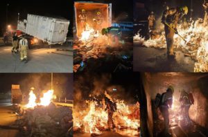 Container vol karton in brand bij bedrijf aan de Transportweg