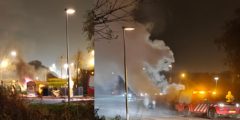 Vlammen slaan uit kledingcontainer aan de Vrijenburgweg