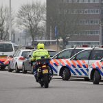 Politieauto's en politiemotor in Barendrecht