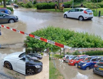 Grote waterlekkage aan de Lavendelhof, straat en parkeervakken volgelopen met water