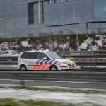 Politieauto op de snelweg