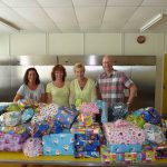 Cadeautjes voor kinderen voedselbank van opbrengst beurs Carnisse Haven